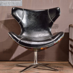 Vintage - inspired Black Leather Chair with Modern Base