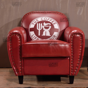 Classic Red Leather Armchair with Themed Design