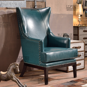 Elegant Teal Leather Wingback Chair with Retro Touches